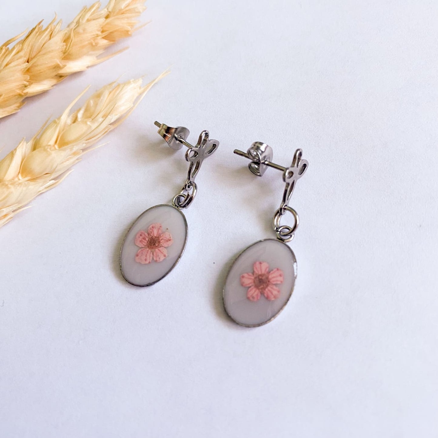 Cercei delicați cu flori roz