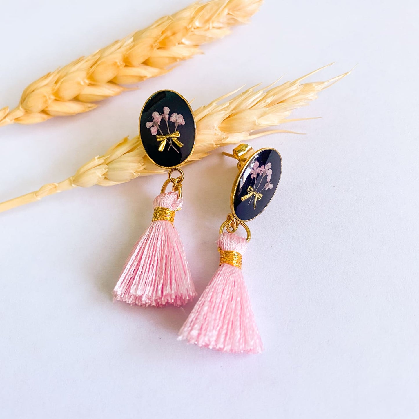 Cercei cu flori și ciucuri roz