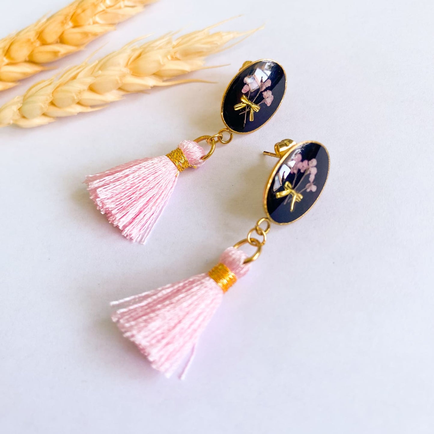 Cercei cu flori și ciucuri roz