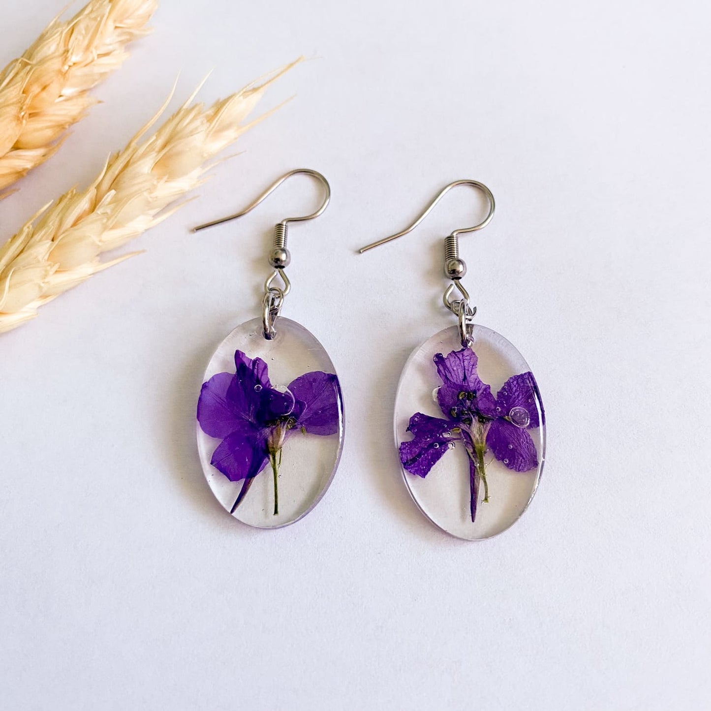 Cercei ovali cu flori mov