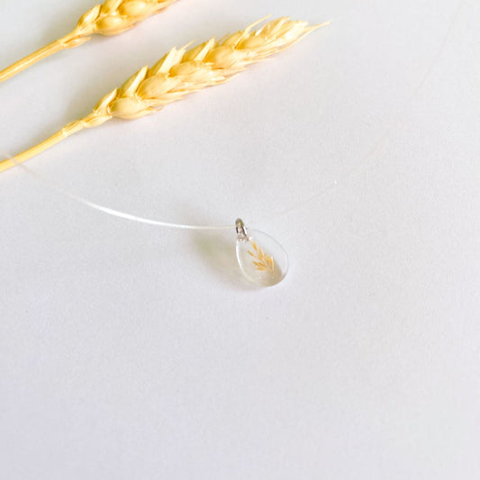 Lănțișor pe fir transparent cu spic oval